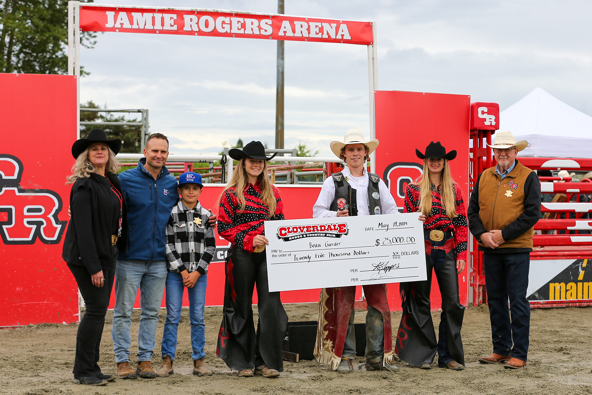 2025 Cloverdale Rodeo - Bull Riding Champion - Beau Gardner - Holding the Cheque 2025 Cloverdale Rodeo - Barrel Racing Champion - Kyla Simmons - Holding the Cheque
